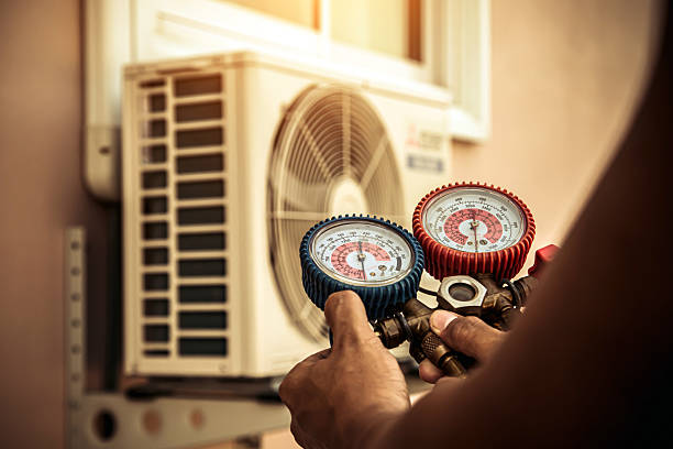 Professional Heat Pump Repair technician working in Northport, WA